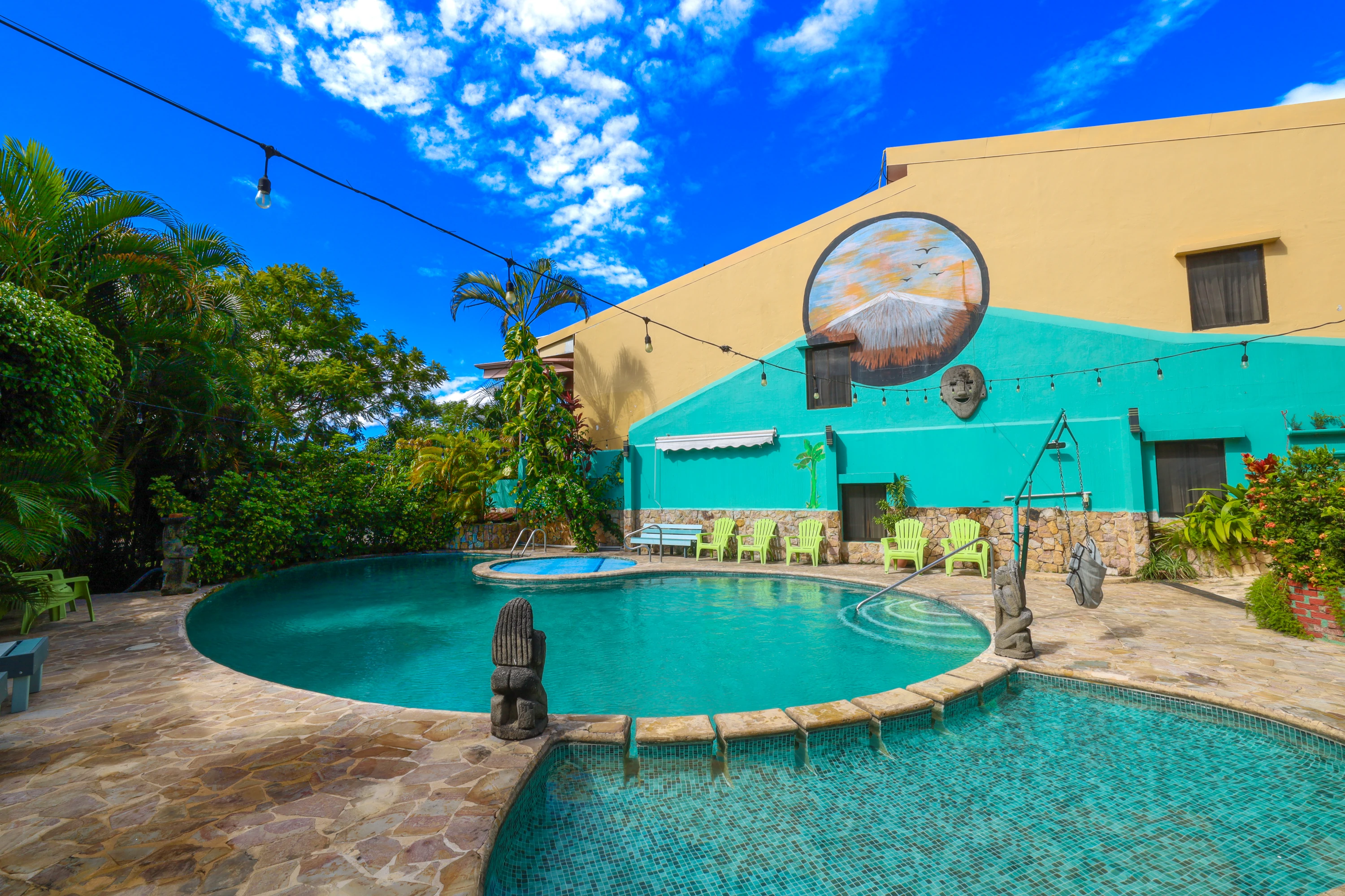 Solar-heated pool with accessible lift for gentle recovery exercise