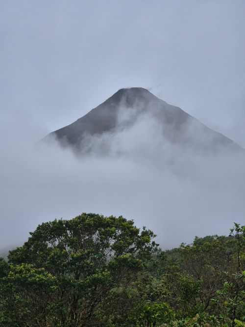 Arenal volcano & hot springs—classic day trip.