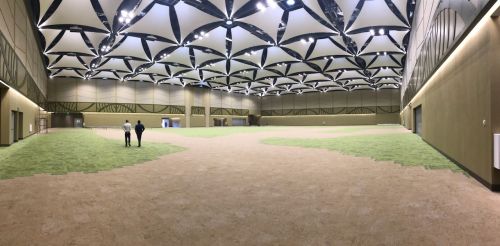 Main plenary hall with fabric sail ceiling — capacity for 4,000 attendees.