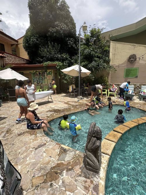 Families enjoying the pool — kids love it here.