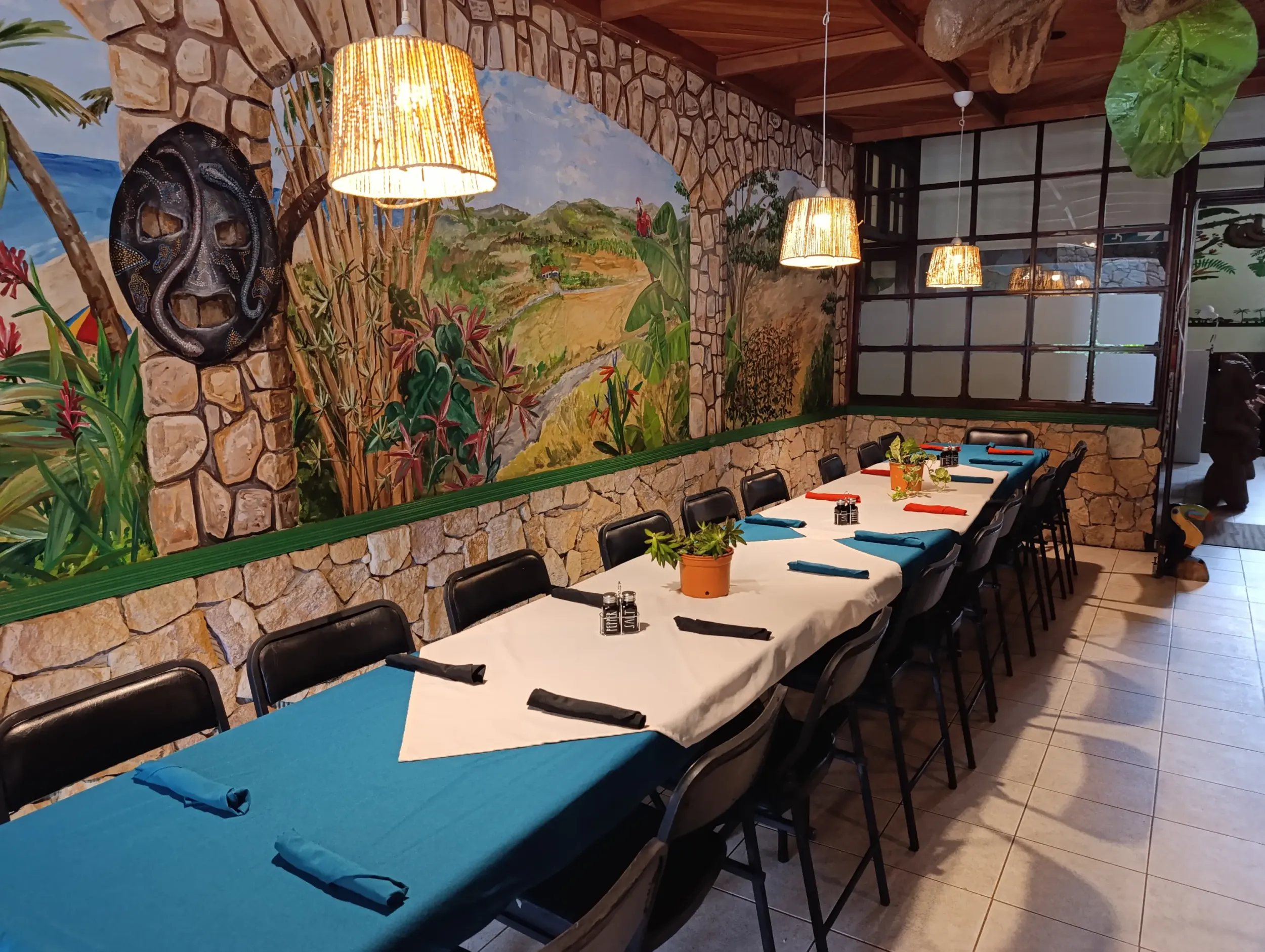 Long banquet table set for a large group in Moon Glow Bar & Grill