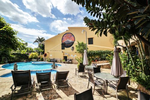 Solar-heated pool and garden — open to all guests.